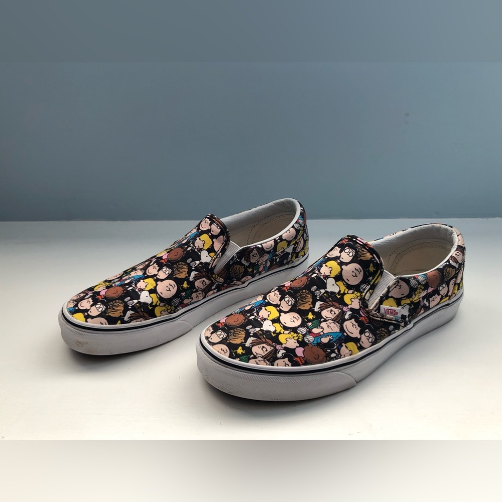 Vans unisex Slip-On Sneakers in Black Multi Character Print
